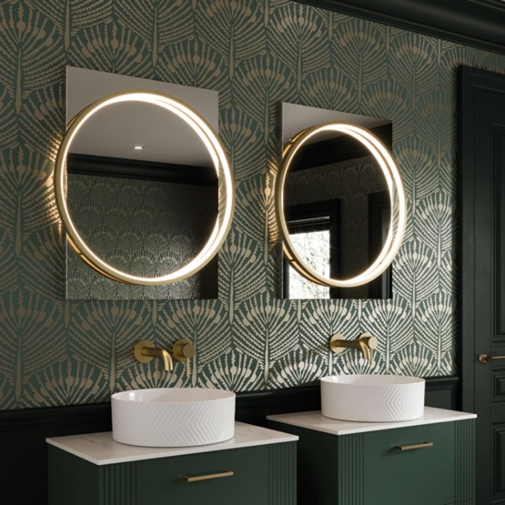 Product Lifestyle image of two HIB Solas Brushed Brass Round LED Bathroom Mirrors